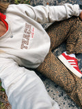 Cheetah Teach Crewneck